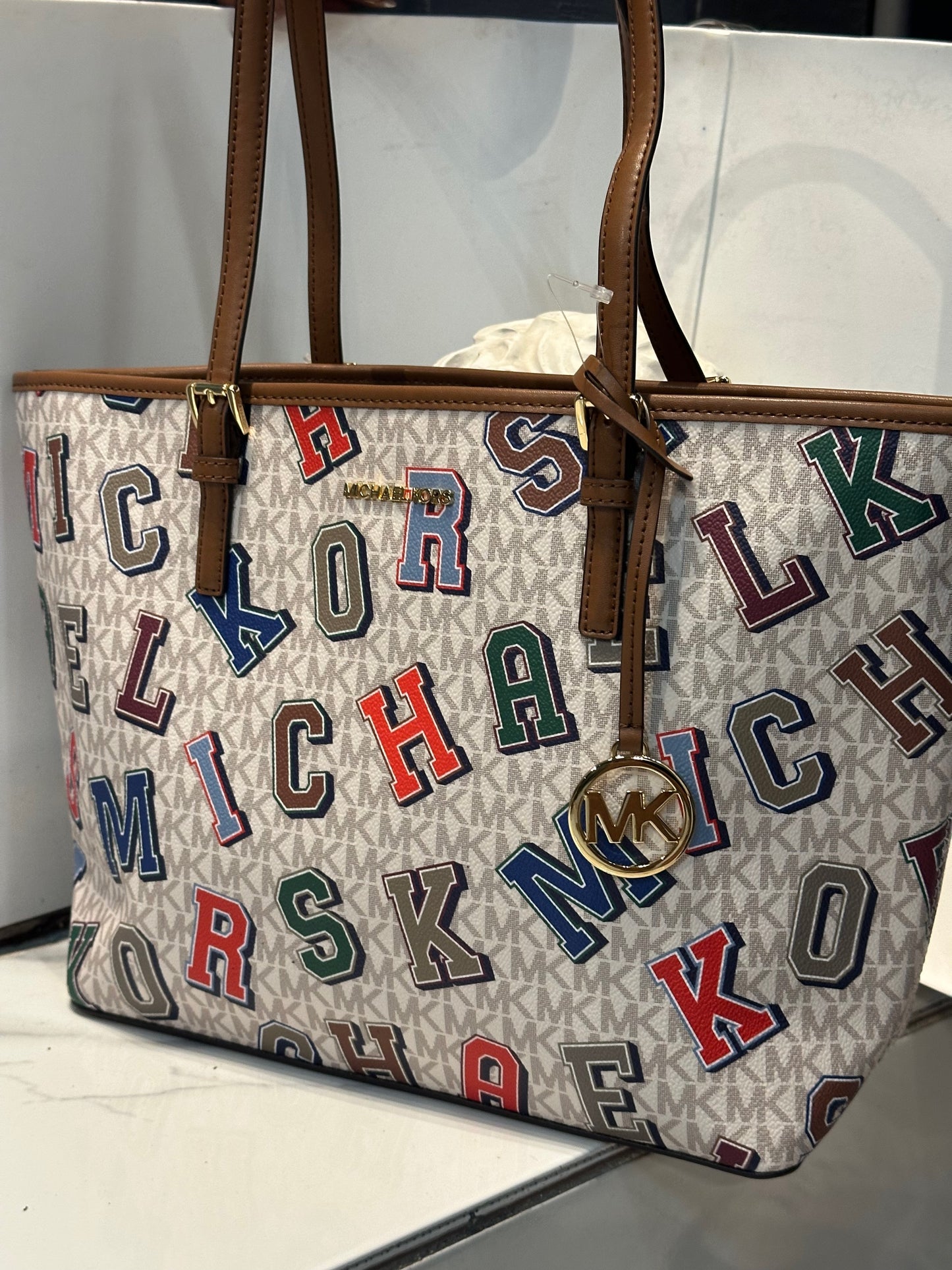 Bolso Michael Kors Jet Set Travel con estampado de letras del logotipo