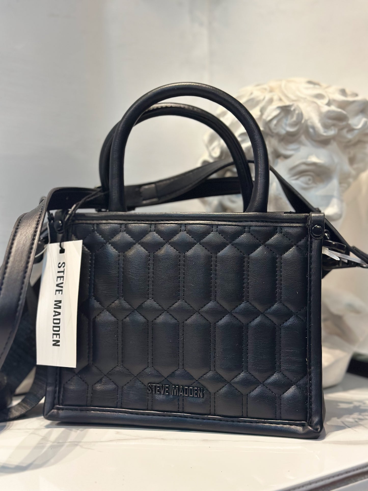 Bolso Steve Madden negro acolchado